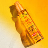 NUXE Sun Tanning Oil Face and Body SPF 10 (150ml) - Exclusive